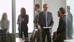 MS Business executives collaborating on project during meeting in office conference room Stock Footage