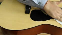 Man clean the guitar Stock Footage
