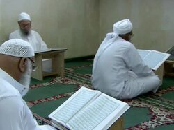 MS Older mens  reading religious book  / Bethlehem, Palestine Stock Footage
