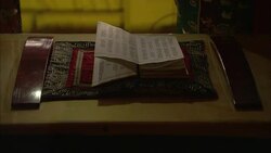 A book of scriptures lies open on a platform in the Bai Yun Guan Temple in Beijing. Stock Footage
