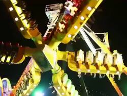 MS TS Shot of People enjoying amusement ride at star shape starts  / Cologne, Germany Stock Footage