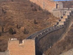 A shot panning down a well preserved section of the Great Wall of China. Stock Footage
