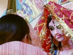 MS Woman worshiping goddess during Durga puja celebration / Kolkata, West Bengal, India Stock Footage
