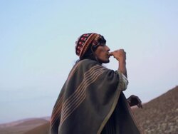 MS LA Shot of mam showing Native ritual AUDIO / South Of Peru, Nazca, Peru Stock Footage