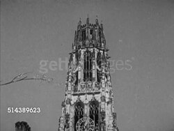 1953: YALE UNIVERSITY: NEW HAVEN, CONNECTICUT:  VS Various campus buildings at Yale University (private Ivy League), including the Harkness Tower, various students walking on campus, entrance to Yale Daily News building on York Street. CT, education Instructional Video