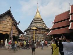 Asian people praying with candle light with temple Stock Footage