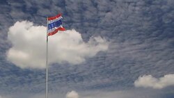 Thailand flag against a blue sky Stock Footage