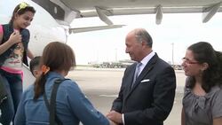 CLEAN : Iraqi refugees arrive in Paris News Clip