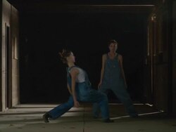 two dancers dancing together in wooden barn Stock Footage