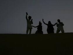 Rajasthani people dancing on desert, Sam Desert, Jaisalmer, Rajasthan, India Stock Footage