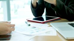 Business peoples developing a business project and analyzing market data information Stock Footage