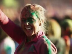 young woman dancing and jumping up and down at a Hindu festival Stock Footage