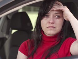 HD: Woman Weeping In A Car Stock Footage