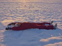 WS Girl Having Fun Making Snow Angels Stock Footage