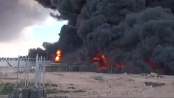 CLEAN : Firefighters battle Libya oil facility blaze News Clip