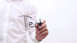 Hand Writing 'Technology' Stock Footage