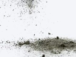 CU SLO MO Shot of Ashes Falling against White Background / Calvados, Normandy, France Stock Footage