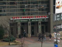 A close up shot of the Xcel Energy Center in St. Paul Minnesota showing fans entering the building Stock Footage