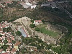 AERIAL WS Townscape with castle / Abrantes, Santarem, Portugal Stock Footage
