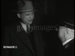 1939: U.S. POLITICIANS:  MS Texas Representative Martin Dies Jr (1900-1972) talking w/ train conductor. INT VS National Committee member James A. Farley (1888-1976, L), Advisor Harry L. Hopkins (1890-1946, C-L) talking w/ other men. Washington D.C. Instructional Video