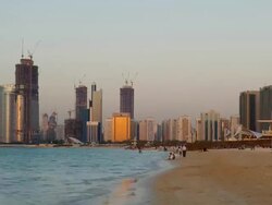T/L of beach and seafront buildings in Abu Dhabi, United Arab Emirates, November 2009 Stock Footage