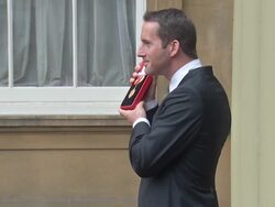 Ben Ainslie Poses with Knighthood News Clip