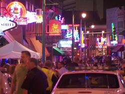 WS People walking on beale street at night / Memphis, Tennessee, United States Stock Footage