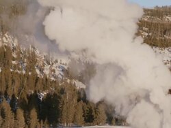 WS TU Geyser erupting in evening light / Yellowstone National Park, Wyoming, United  Stock Footage