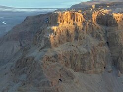 WS AERIAL ZO Cave on mountain / Masada, Sourn Judea Desert, Israel  Stock Footage