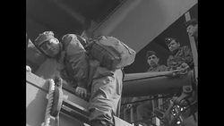 GIs disembark from SS Henry Ward Beecher prior to its being towed News Clip