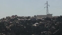 VOICED : Rubbish piles up as battle for Syrian News Clip