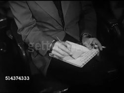1952: WASHINGTON PRESS CONFERENCE: Charles E. Wilson & incumbent Robert Lovett, PAN Men taking notes seated in front row, Lovett & Wilson sitting at table, SOT Wilson saying Lovett being good American, helping him, using sports baseball analogy. Instructional Video