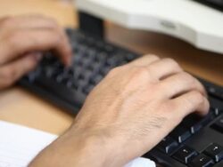 Male hands typing on keyboard Stock Footage