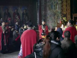 MS Taoist do religious rites with pilgrims to pray for good luck in grand hall of temple during Chinese Lunar New Year  AUDIO  / xi'an, shaanxi, china Stock Footage