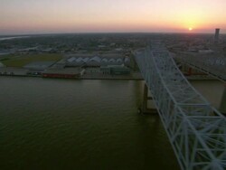 AERIAL WS View of new orleans bridge at sun set / New Orleans, Louisiana, United States  Stock Footage