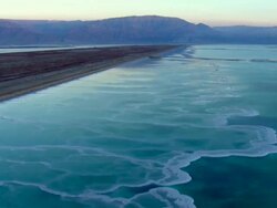 AERIAL MS CU DS View of dead sea / Sourn Judea Desert, Israel   Stock Footage