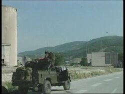YUGOSLAVIA: KOSOVO: NATO TROOPS ENTER KOSOVO: HANDOVER News Clip