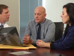 Male Doctor Gives Radiology Results to Couple Stock Footage