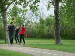 Family wlaks and talks together Stock Footage