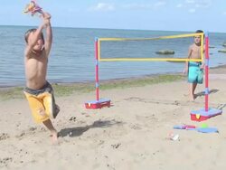 Children playing beach game Stock Footage