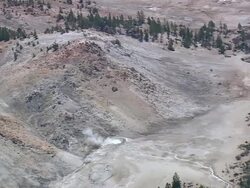 WS AERIAL View over Bubbling Pool and surrounded by broken forests / Wyoming, United States Stock Footage