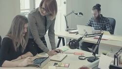 New business team: at work together in the startup office Stock Footage