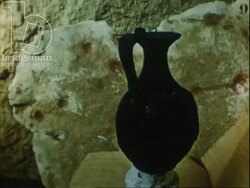 In museum, ancient artifacts including utensils and jewelery. Churches and statues, Carnac, France, 1950s Stock Footage