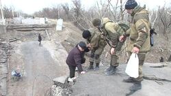 CLEAN : Bridge bombing leaves east Ukraine locals climbing ladder News Clip