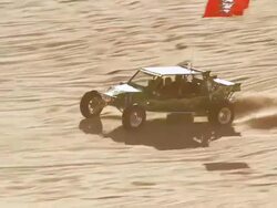 WS TS ZO Luxury sandrail racing across sand dunes / Glamis, California, USA Stock Footage