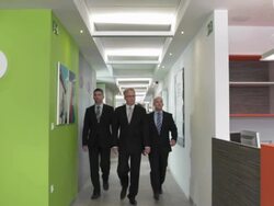 HD DOLLY: CEO Walking With Two Executive Assistants Stock Footage