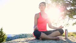 Young African American Woman Doing Yoga in Desert Stock Footage