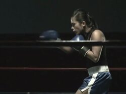 Female boxer in boxing ring Stock Footage