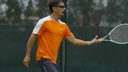 Tennis player practicing his return stance. - Slow Motion Stock Footage