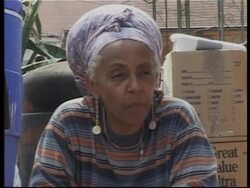 People returning to their homes, aerials outside city Instructional Video